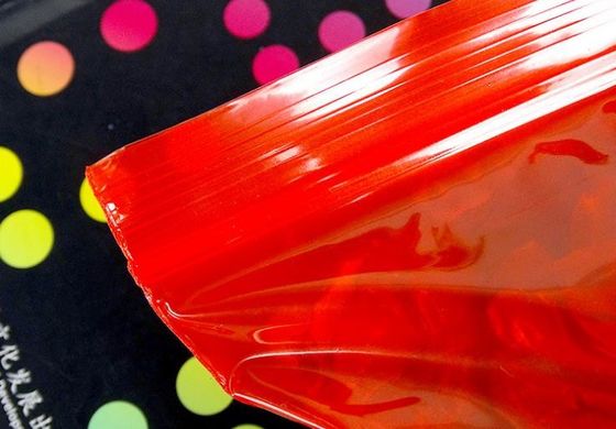 el sello reconectable a prueba de polvo del apretón de la prenda impermeable plástica del ziplock de la categoría alimenticia del LDPE del color rojo empaqueta